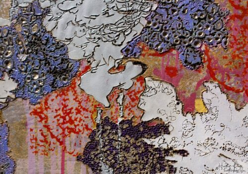 Detail of Les Amas Nuageux by Heather Page, an 11 7/8” by 17 1/8” x 2” monoprint on panel of brightly-colored woodburned, printed, & painted clouds of lichens