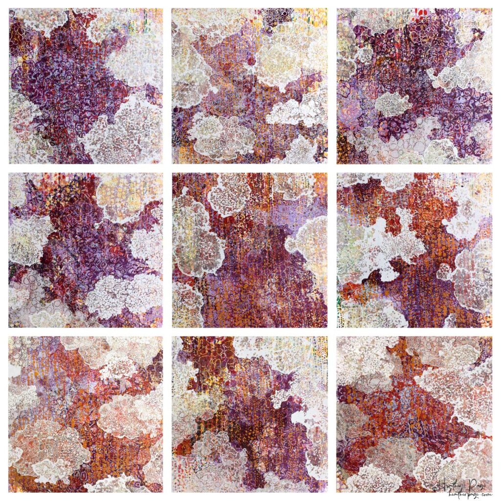 A grid of 9 square abstract monoprints printed in red, purple, & orange edged in lacy white cloud shapes, arranged in lines of 3
