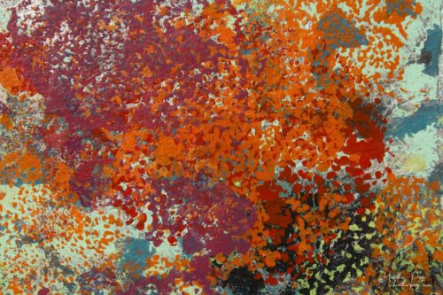 Detail of Le Pyrocumulus by Heather Page, a 25.75” by 15” by 2” silkscreen on panel of a mass of red, orange, seafoam, & blue lichens on a black & silver ground