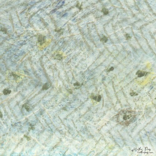 Detail of I / Twelve by Heather Page, a 10.5” by 9.5” monotype on paper of an irregular herringbone-patterned square, with a slice of blue-gray across the top